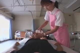 Naughty Japanese nurse works her sexy lips and gifted hands